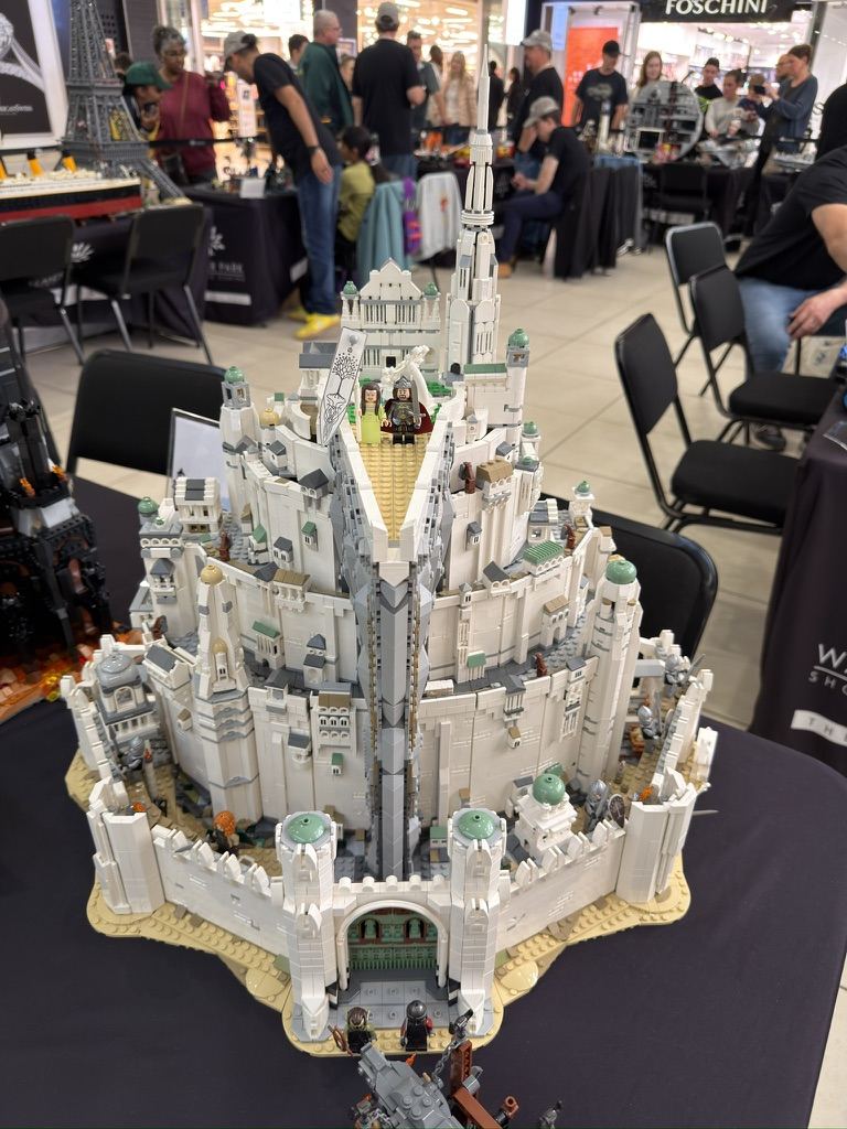 A white LEGO Minas Tirith build towering over a display table in the mall