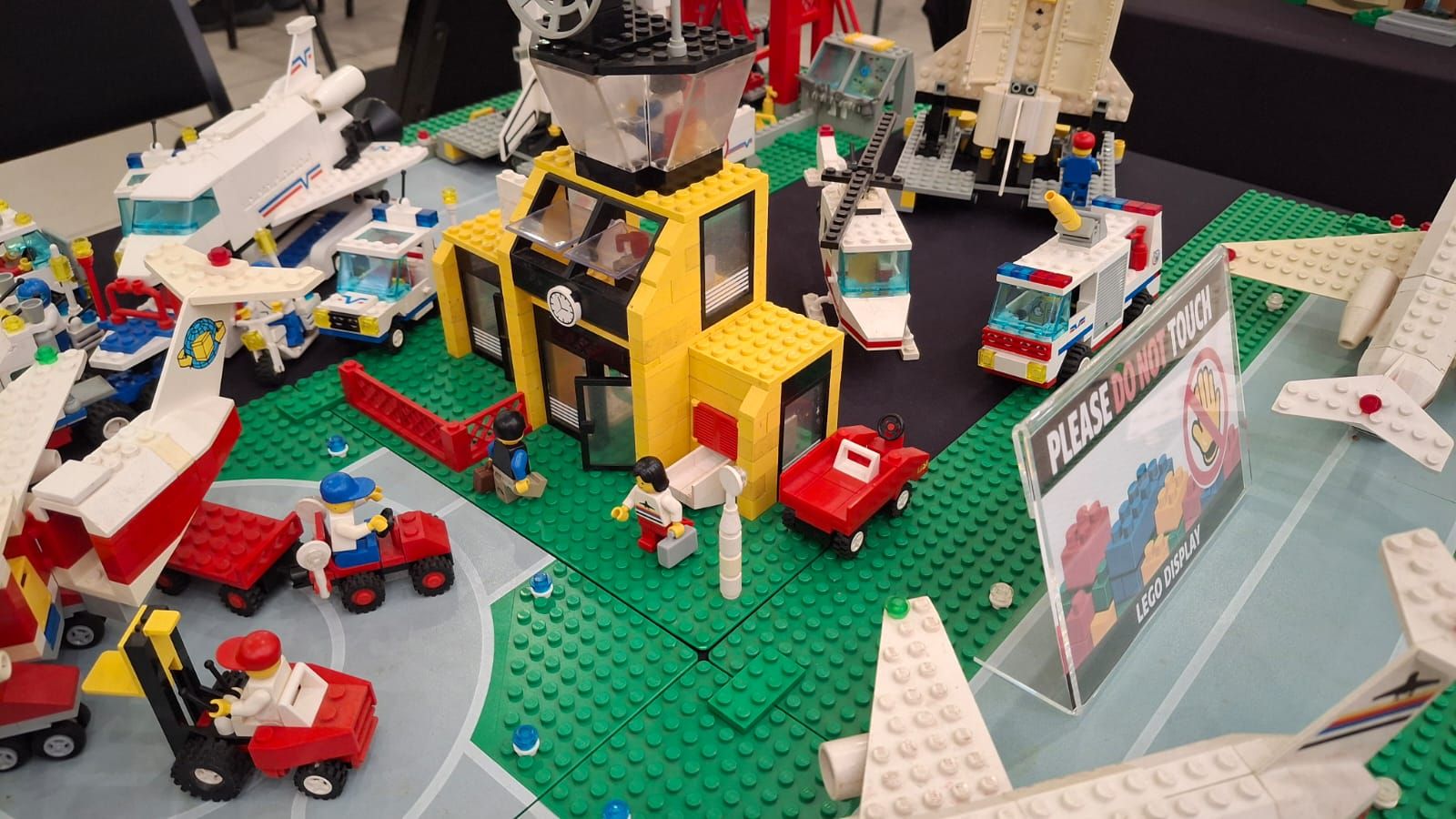 A classic LEGO Town airport with aeroplanes, a control tower and minifigures